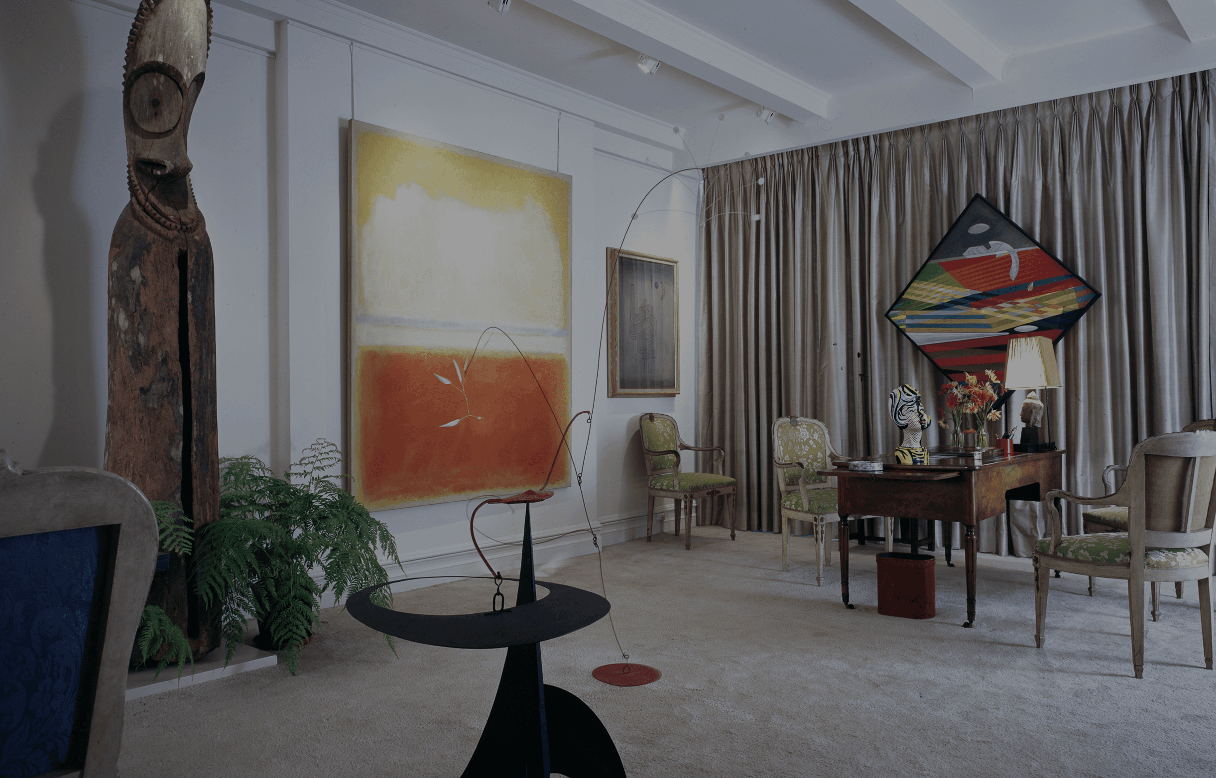 Mark Rothko’s No. 8 (1952), Paul Klee’s Departure of the Ghost (1931), Roy Lichtenstein’s Ceramic Head with Blue Shadow (1966), and Alexander Calder’s Bougainvillea (1945) in the Tremaine’s home.