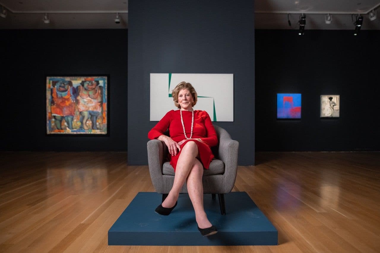 Agnes Gund seated at a Sotheby's auction